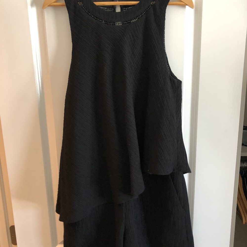 Asymmetrical black romper